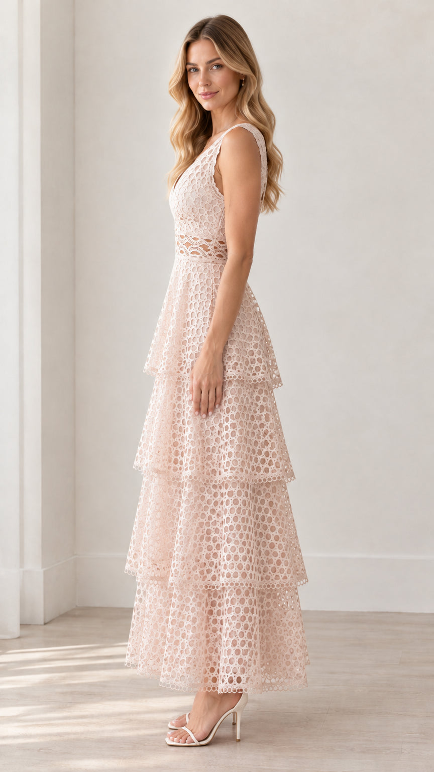 Side profile view of model in Blush Pink tiered lace A-line maxi dress