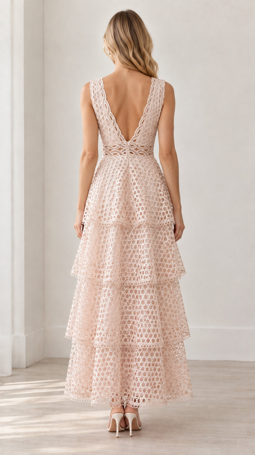 Back view showing deep V-back on Blush Pink tiered lace maxi dress