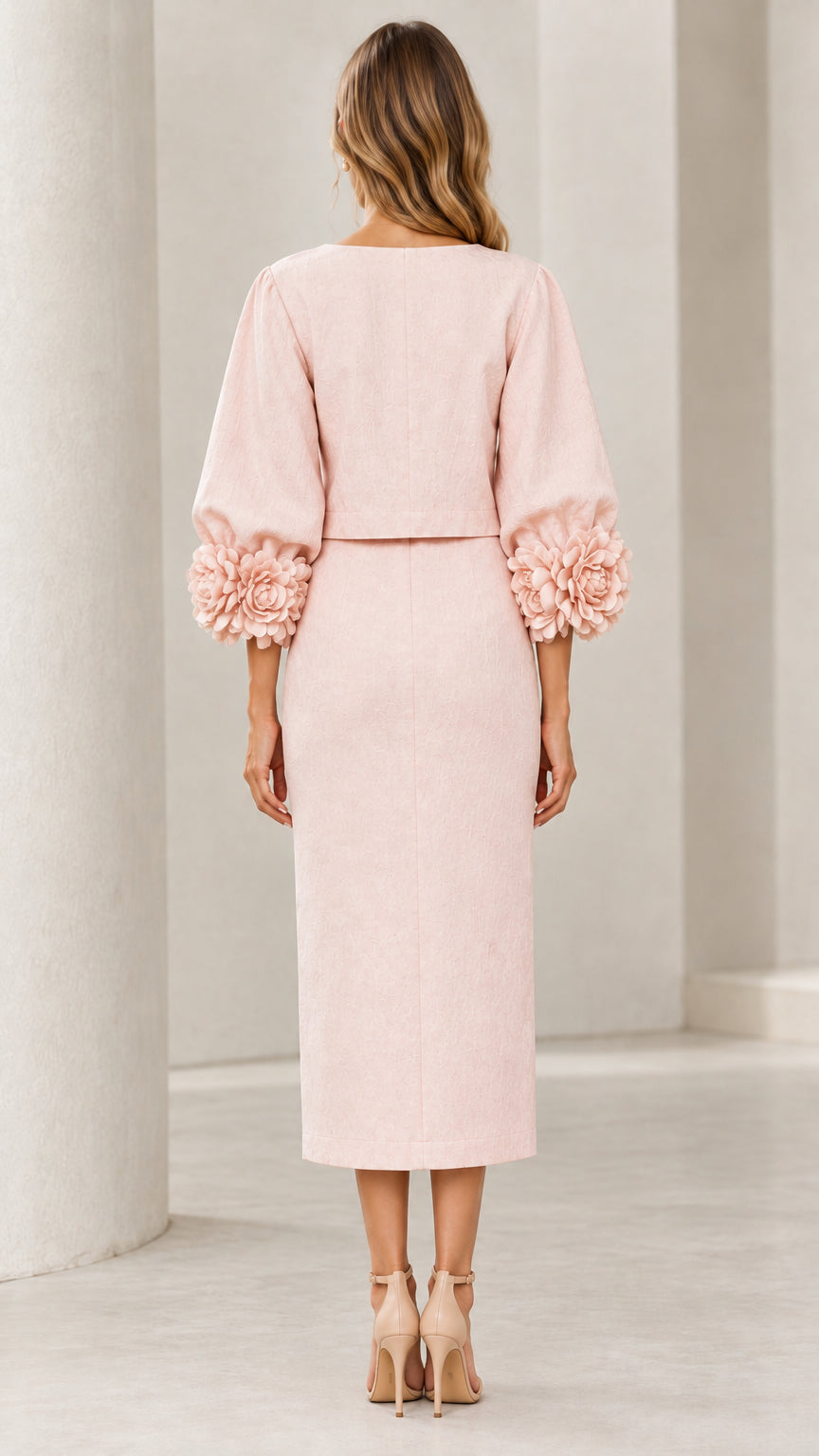 Back view of model wearing Blush Pink structured two-piece skirt set