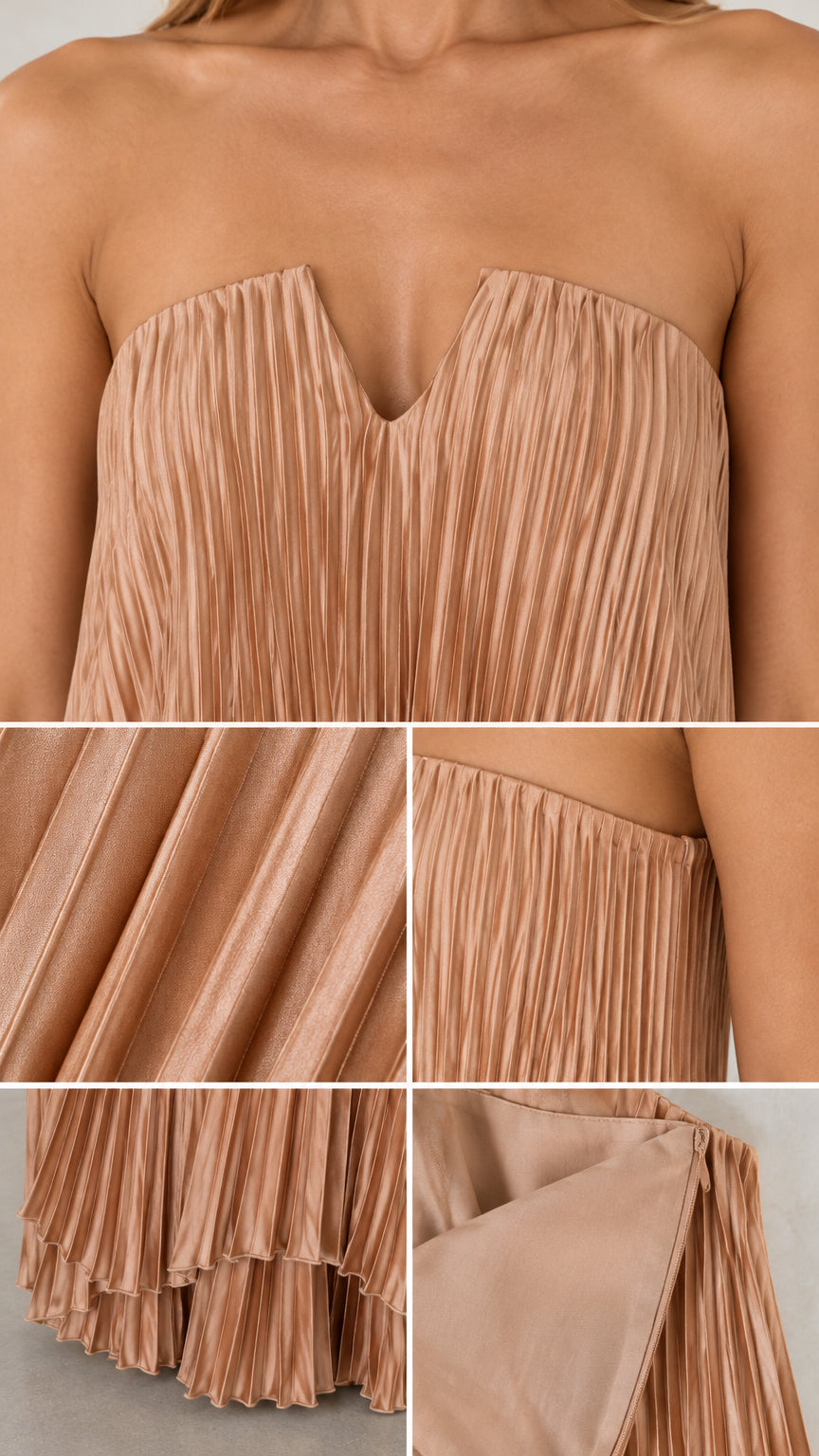 Close-up details of the pleated fabric texture, V-notch neckline, draped hem, and inner lining