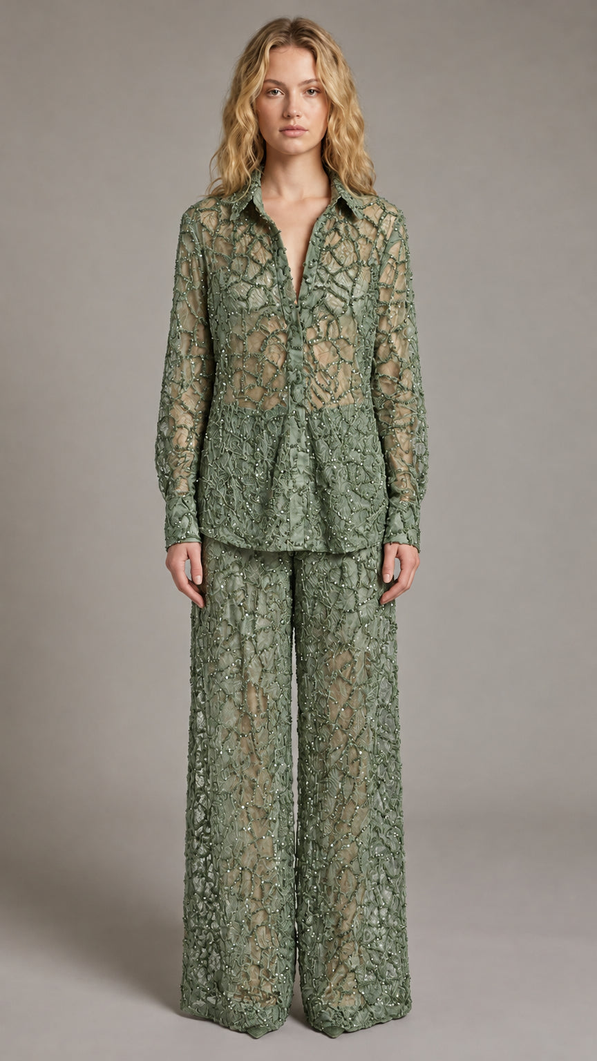 Front view of model wearing sage green sequin lace button-down top and matching pants